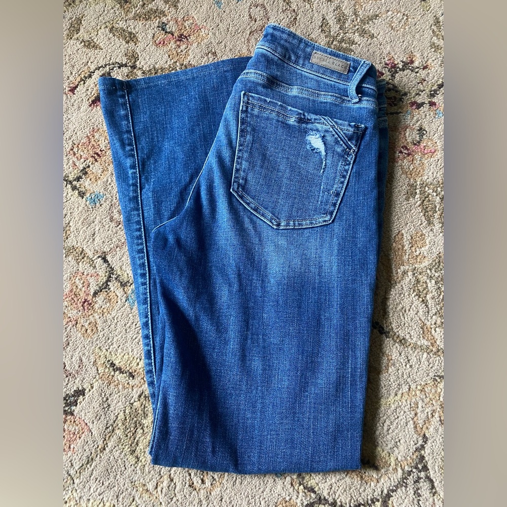 Buckle black bootcut jeans